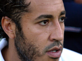 Muammar_Gaddafi_poeg